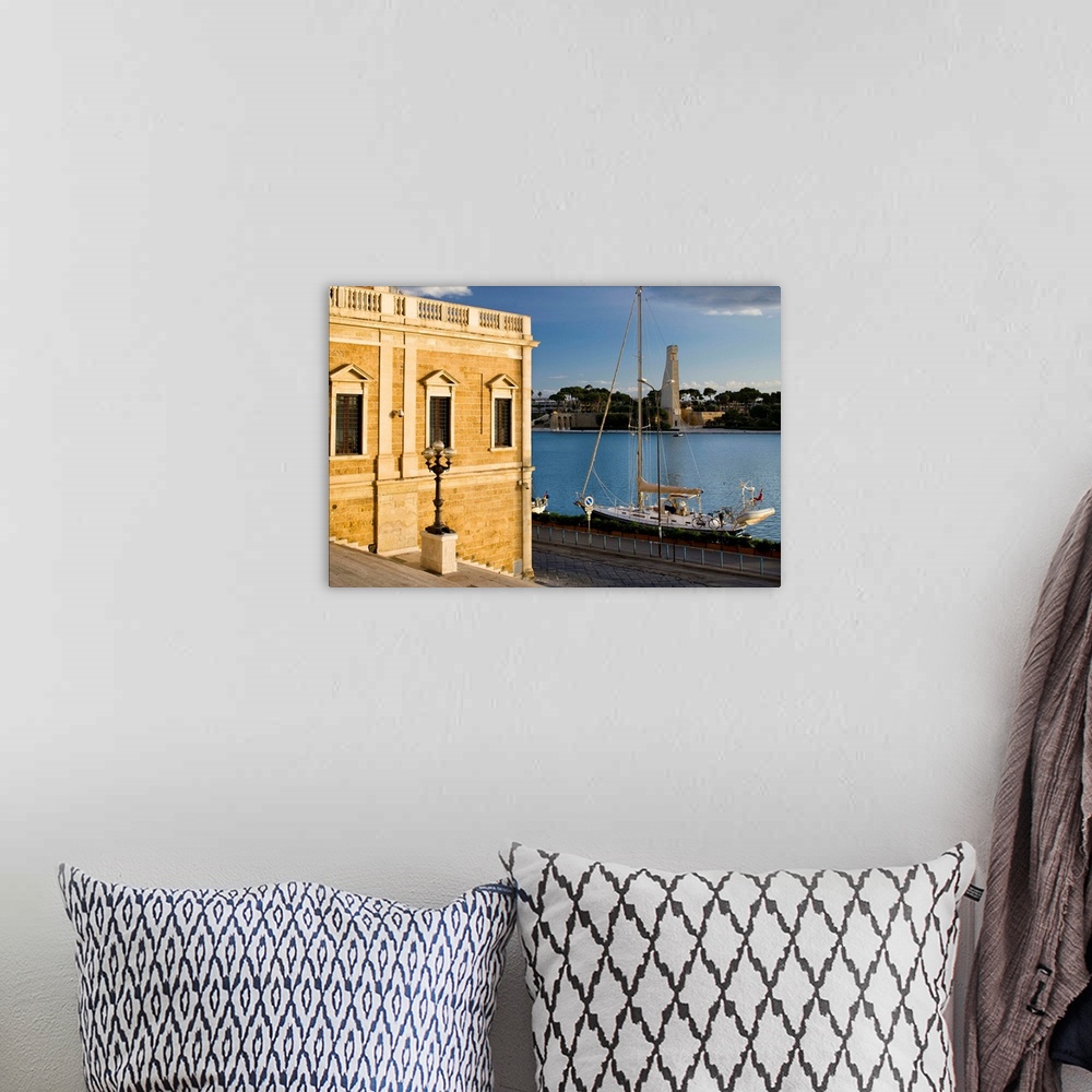A bohemian room featuring Italy, Apulia, Mediterranean sea, Adriatic Coast, Brindisi, View of Sailor Monument from the Roma...