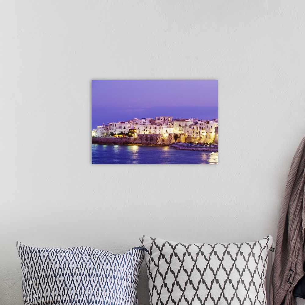 A bohemian room featuring Italy, Apulia, Gargano, Vieste, Foggia district, View of the town