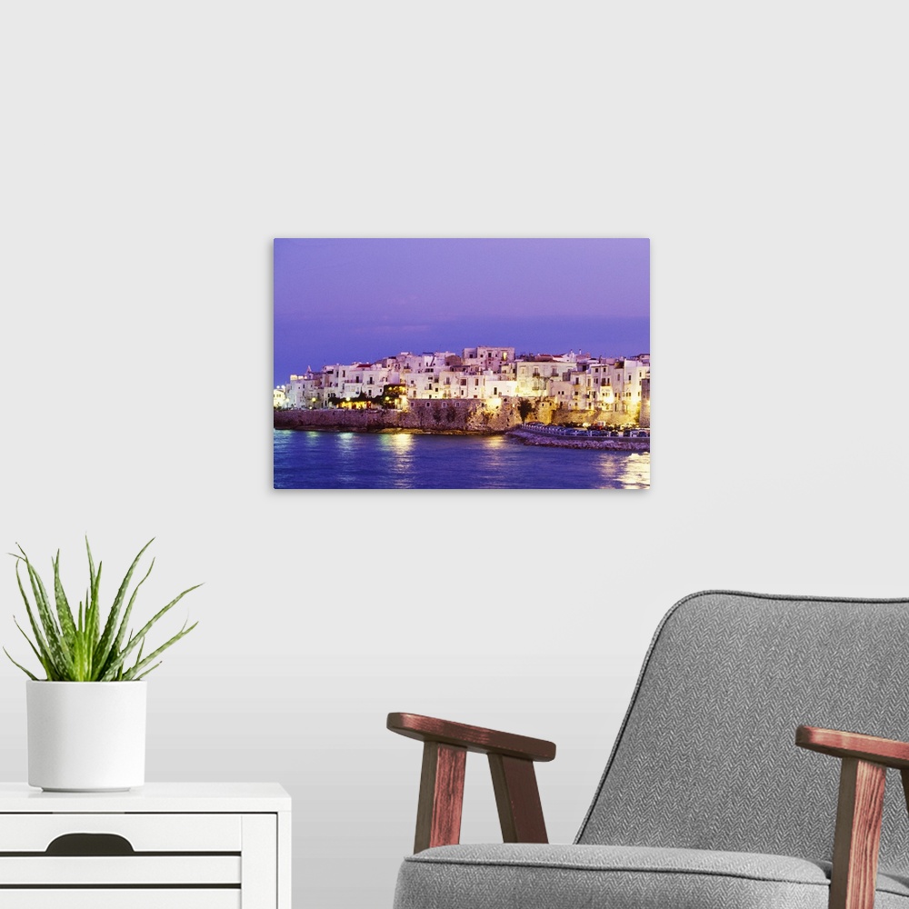 A modern room featuring Italy, Apulia, Gargano, Vieste, Foggia district, View of the town
