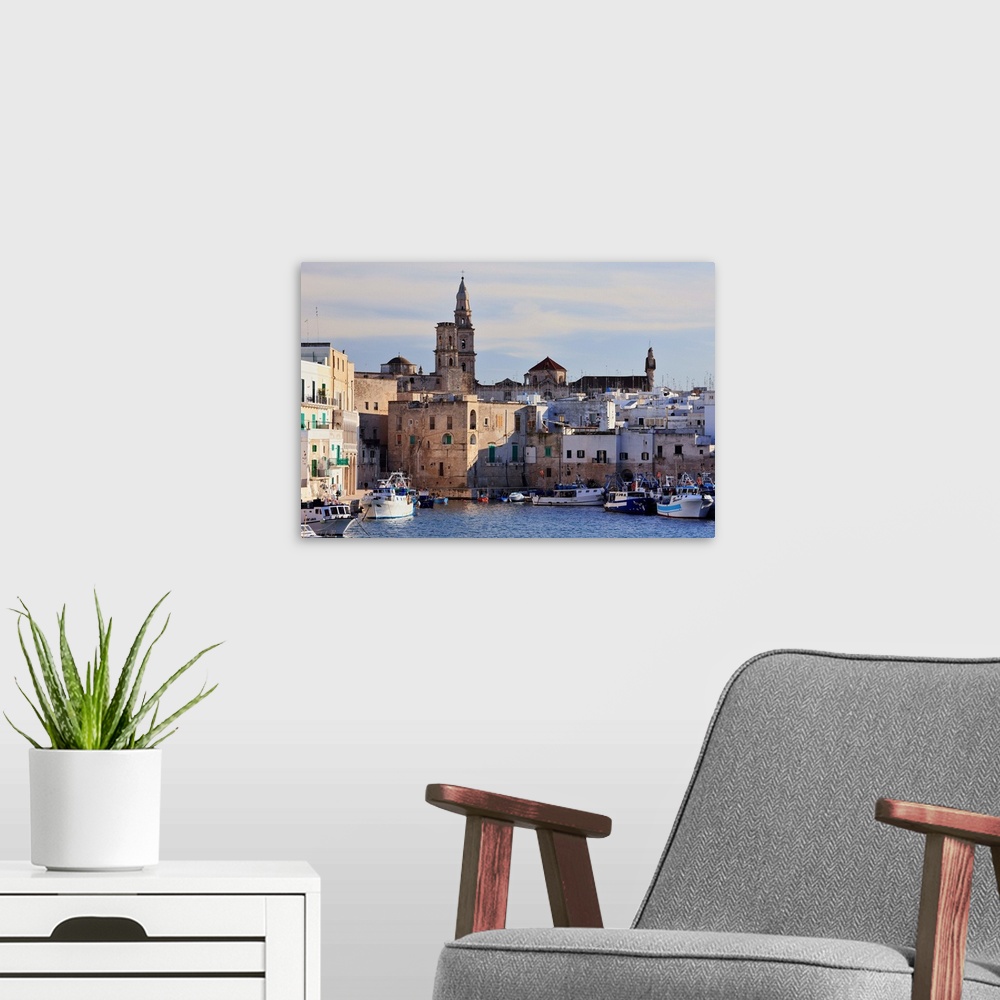 A modern room featuring Italy, Apulia, Murge, Le Murge, Monopoli, View of the old town and fishing port