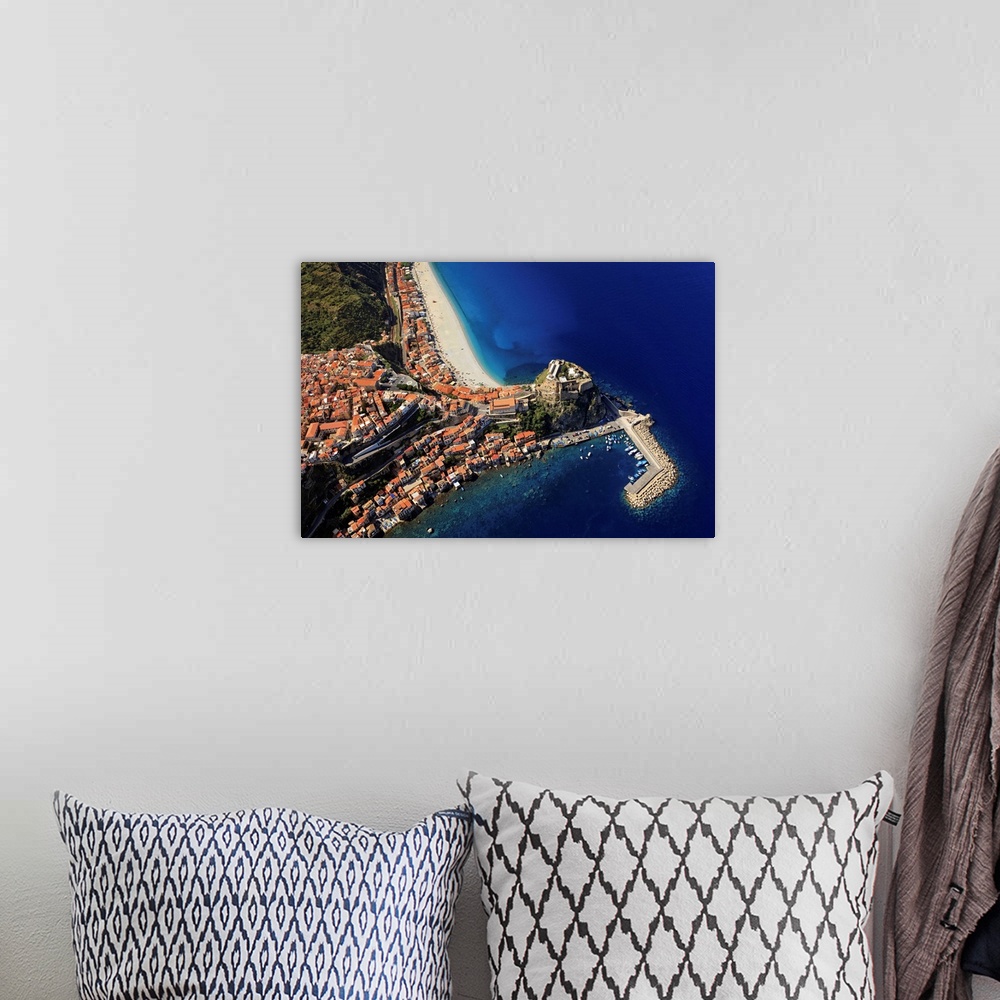 A bohemian room featuring Italy, Calabria, Costa Viola, Scilla, Aerial view of the town, beach and Castle
