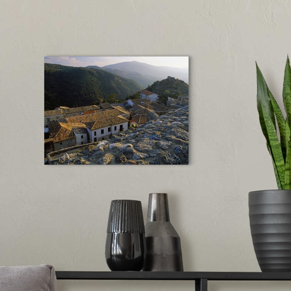 A modern room featuring Italy, Calabria, Ionian Coast, Squillace, View of the village from the Castle