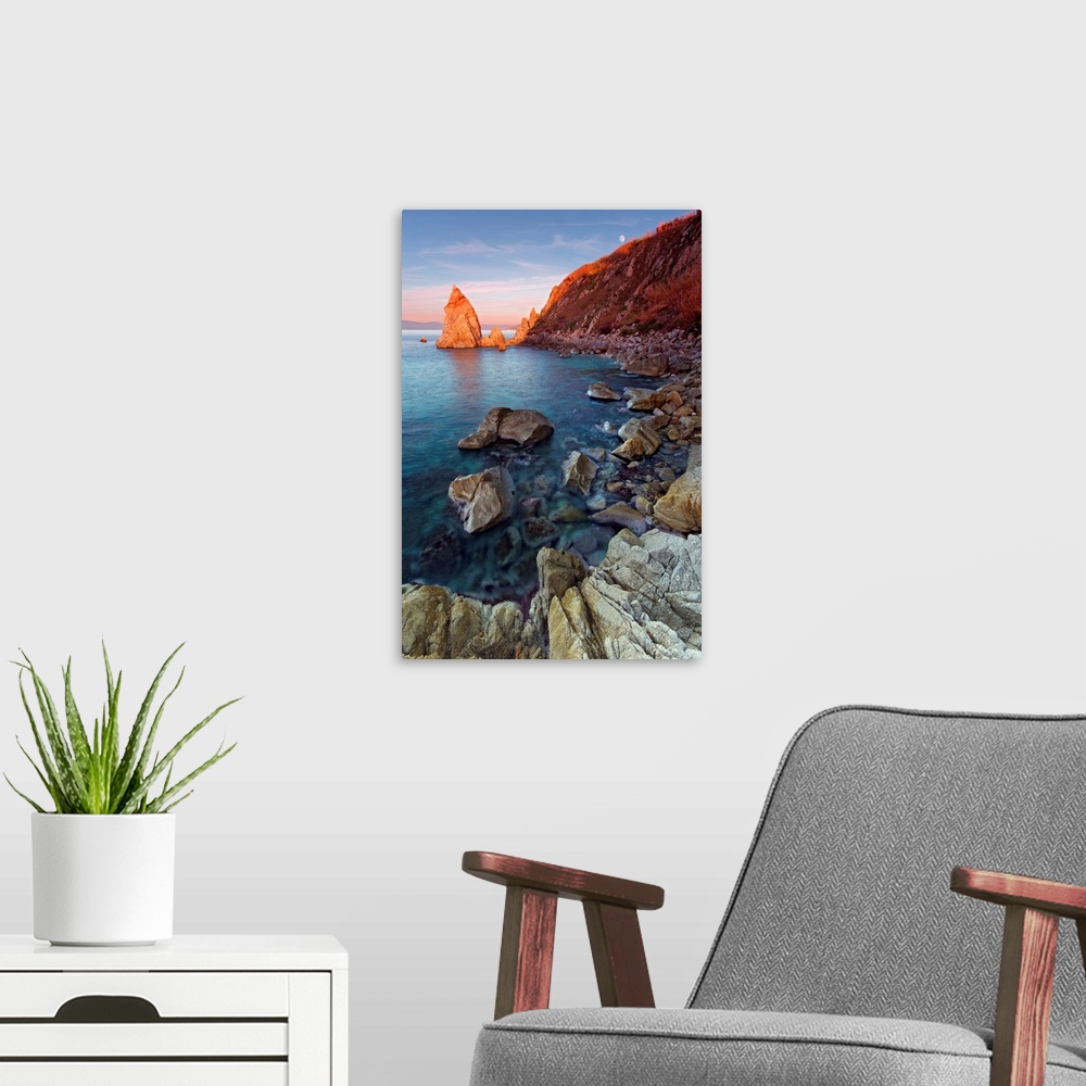 A modern room featuring Italy, Calabria, Mediterranean sea, Vibo Valentia district, Parghelia, Pizzuta Rock at sunset, Pa...