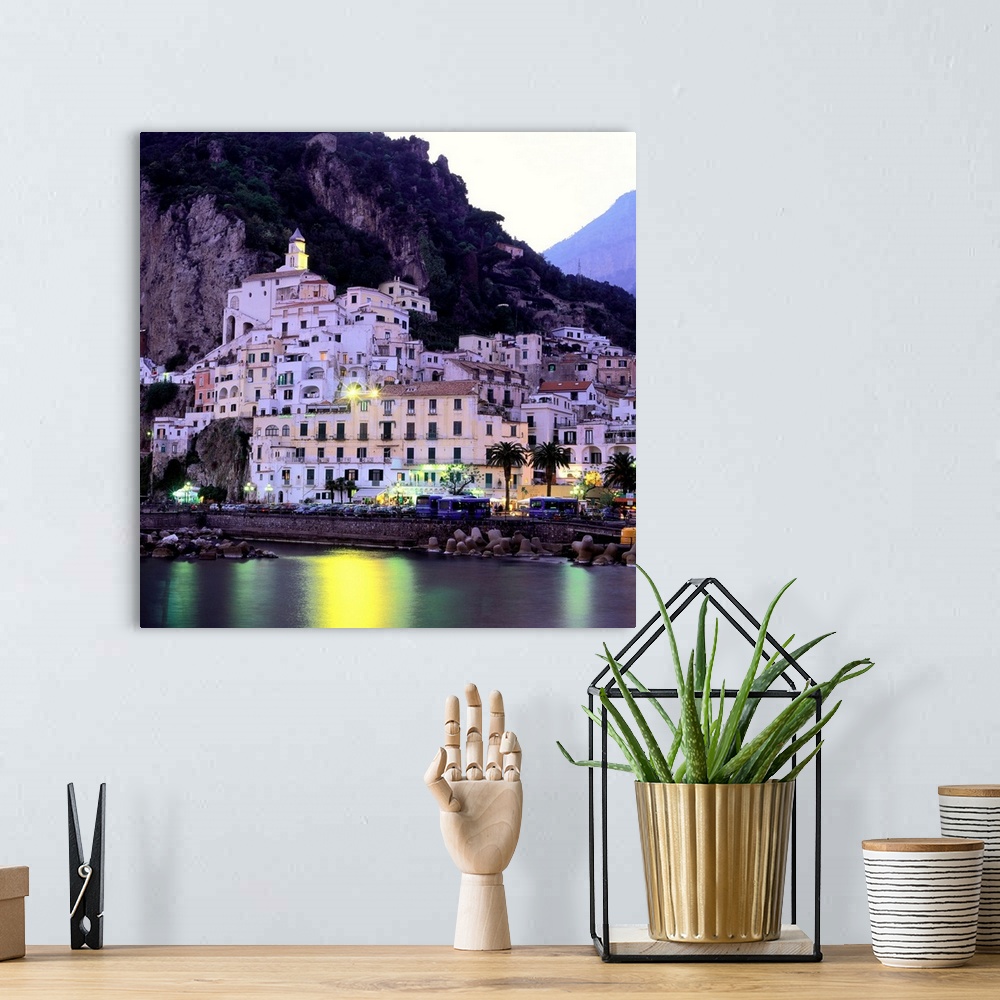 A bohemian room featuring Italy, Campania, Amalfi Coast view of town at dusk