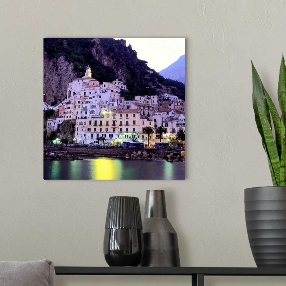 A modern room featuring Italy, Campania, Amalfi Coast view of town at dusk
