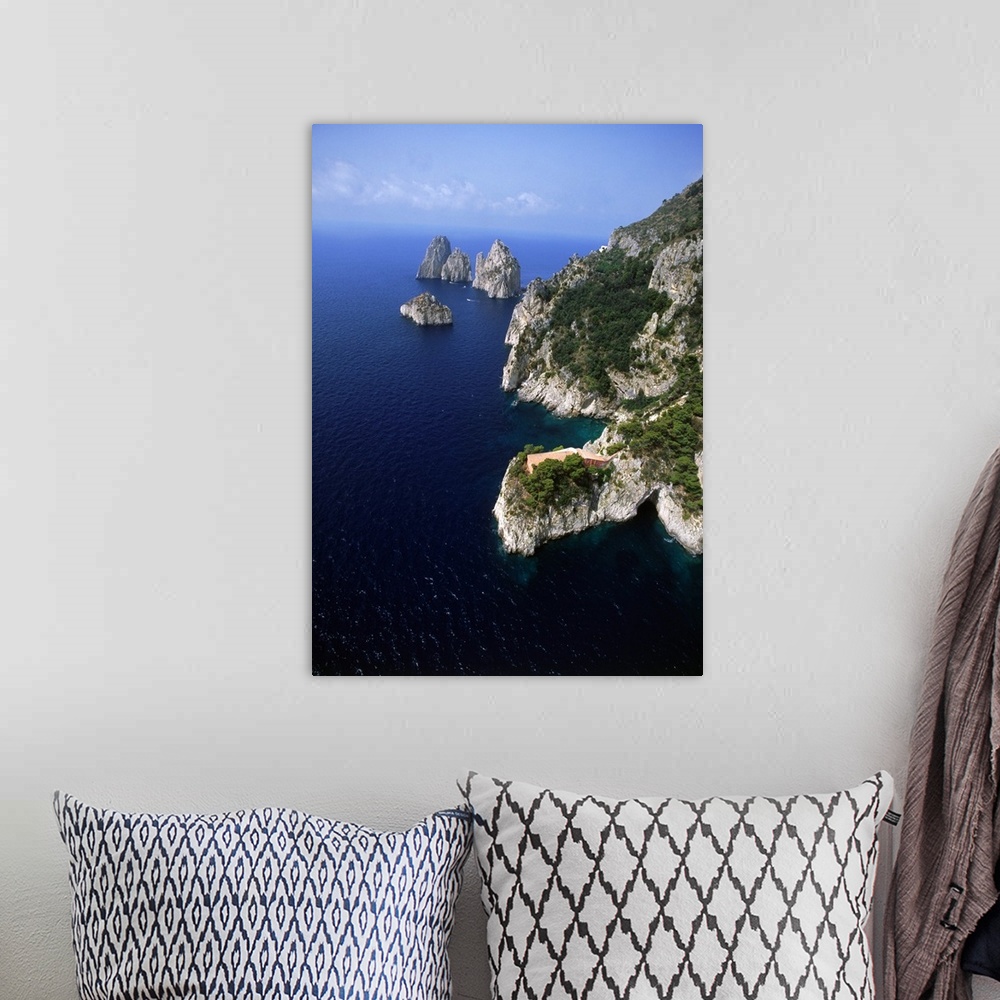 A bohemian room featuring Italy, Campania, Capri, Capri, Villa Malaparte and the Faraglioni on background