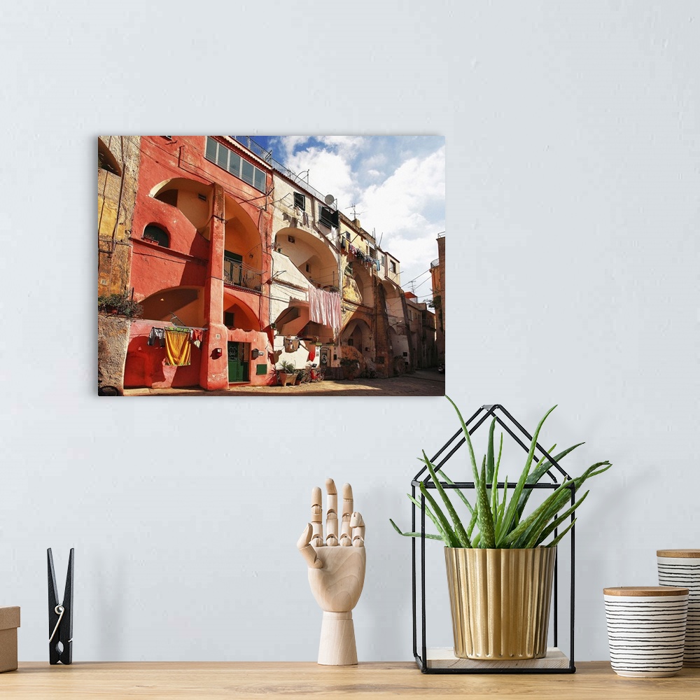 A bohemian room featuring Italy, Campania, Napoli district, Procida, The building known as the Vascello