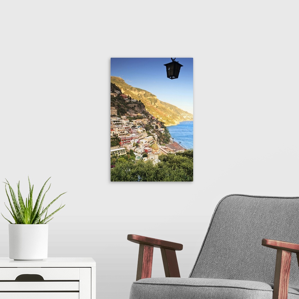A modern room featuring Italy, Campania, Positano, Positano village at sunset