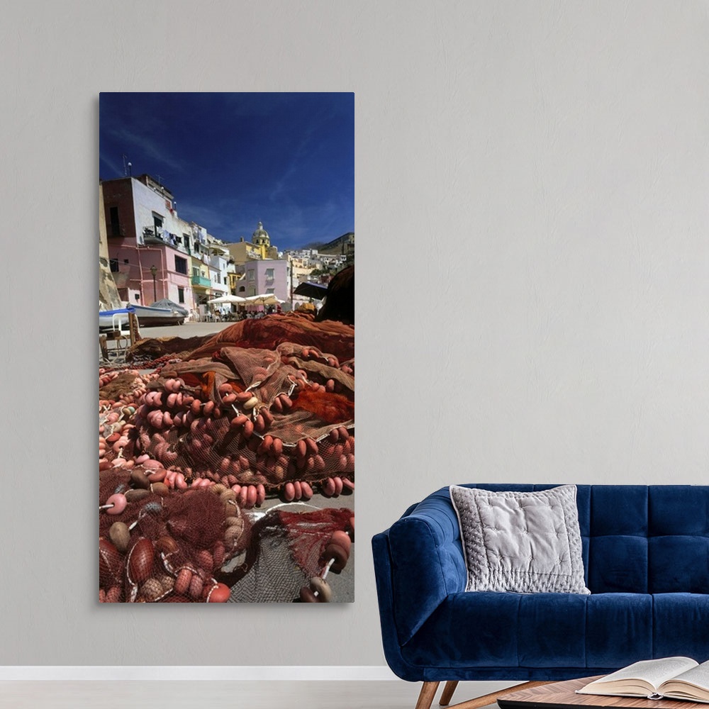 A modern room featuring Italy, Campania, Procida, Procida island, Marina Corricella and fishing net