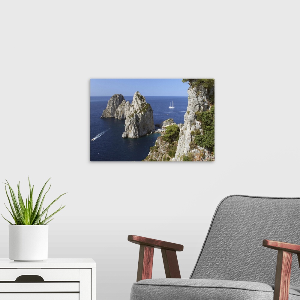 A modern room featuring Italy, Campania, Tyrrhenian coast, Napoli district, Capri, The Faraglioni (stack rocks)