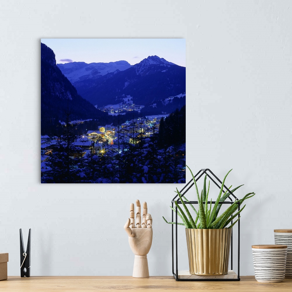 A bohemian room featuring Italy, Dolomites, Trento, view of Canazei town towards Catinaccio