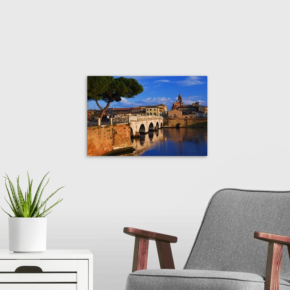 A modern room featuring Italy, Emilia-Romagna, Adriatic Riviera, Rimini, Tiberio Bridge on Marecchia River