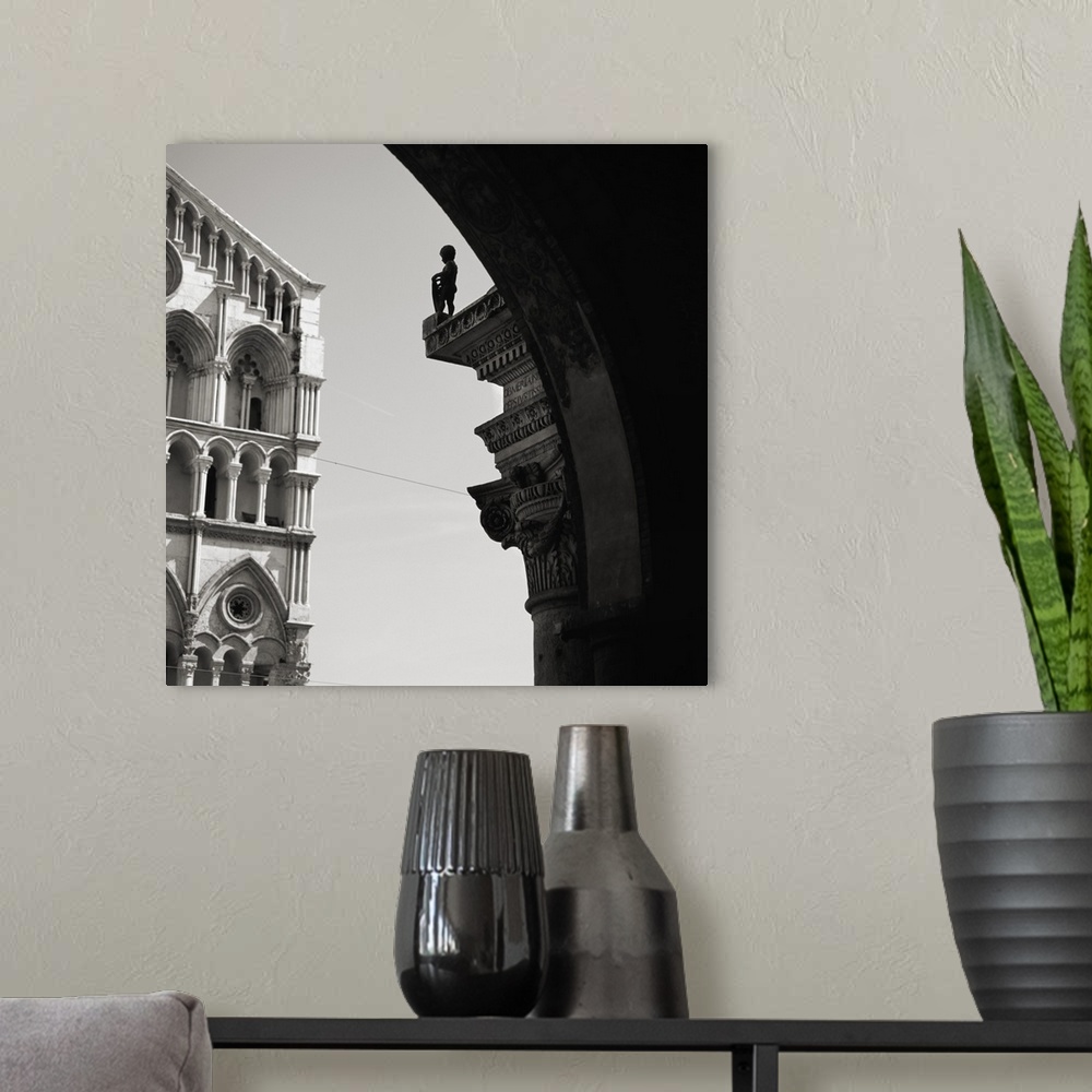 A modern room featuring Italy, Emilia Romagna, Ferrara, Cathedral and statue.