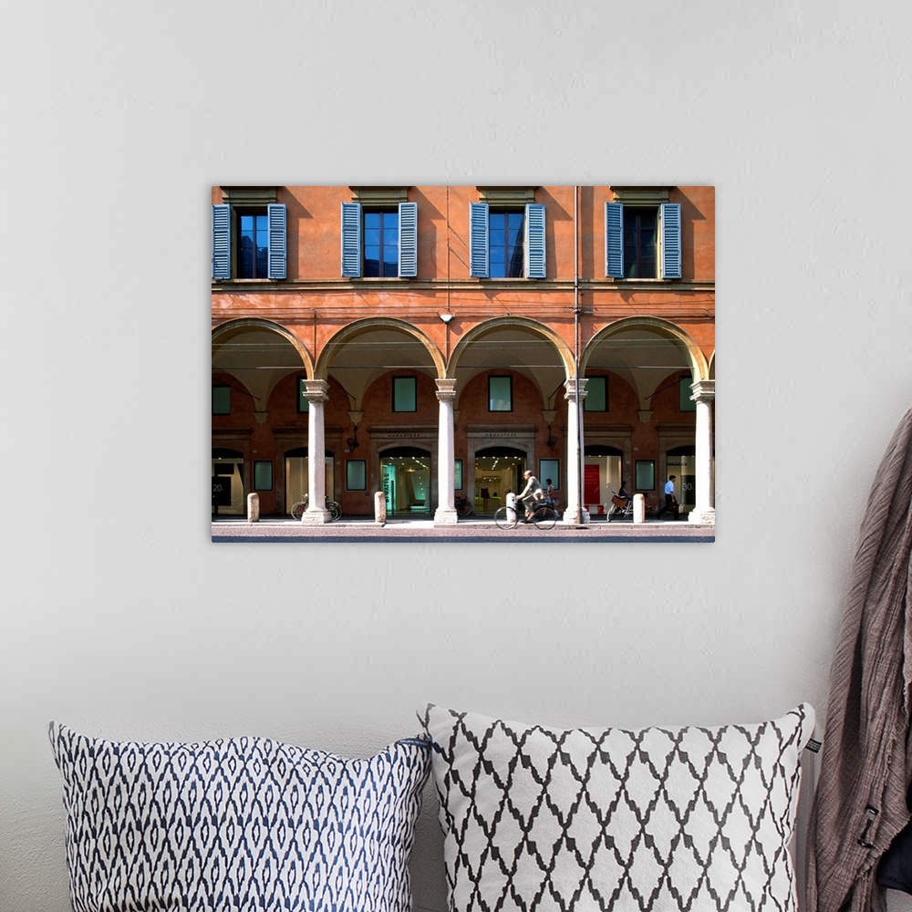 A bohemian room featuring Italy, Emilia-Romagna, Modena, Arcades along Via Emilia