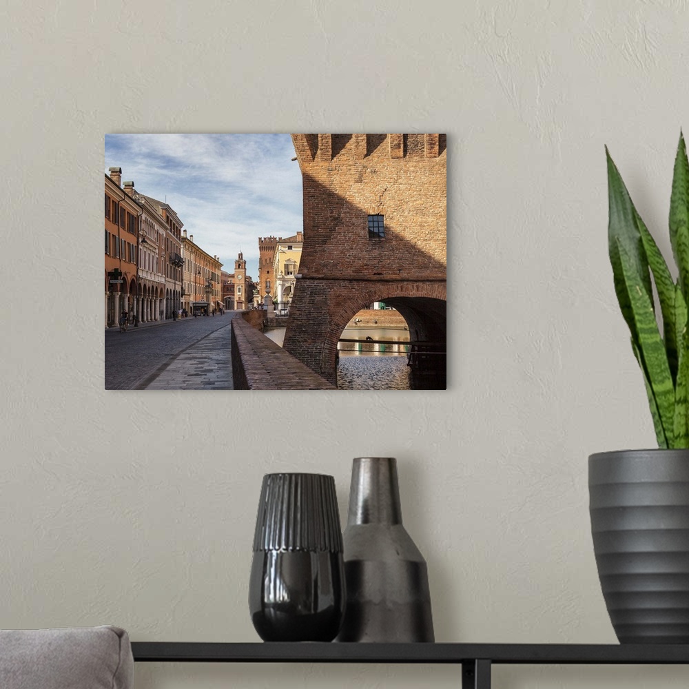 A modern room featuring Italy, Emilia-Romagna, Ferrara district, Ferrara, Martiri della Liberta street, view from the cor...