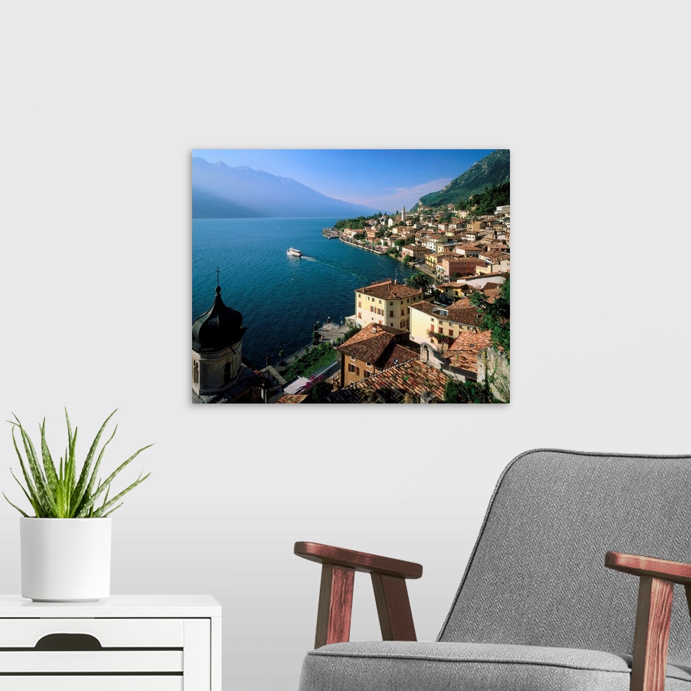 A modern room featuring Italy, Lake Garda, Limone sul Garda towards Monte Baldo