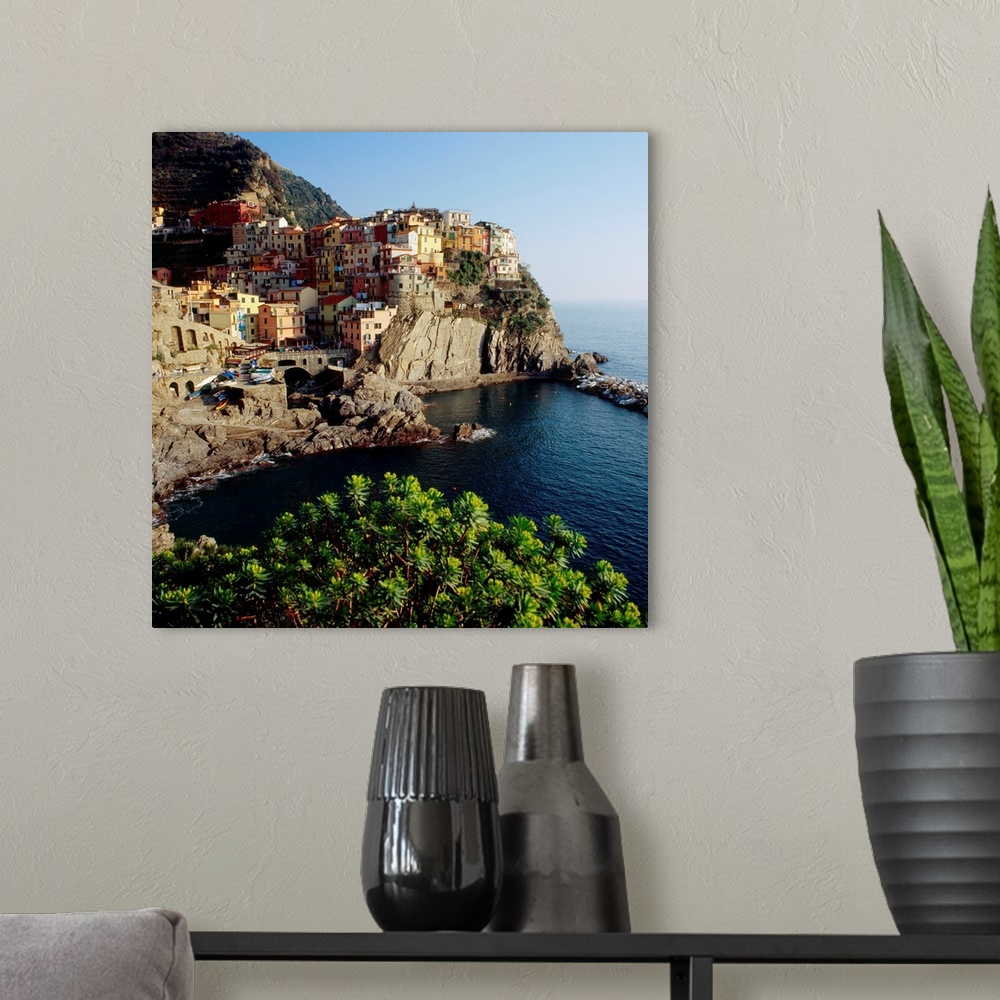A modern room featuring Italy, Liguria, Cinque Terre, Manarola, view towards the village
