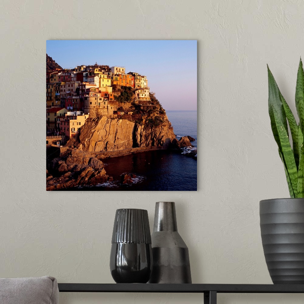 A modern room featuring Italy, Liguria, Cinque Terre, Manarola, view towards the village