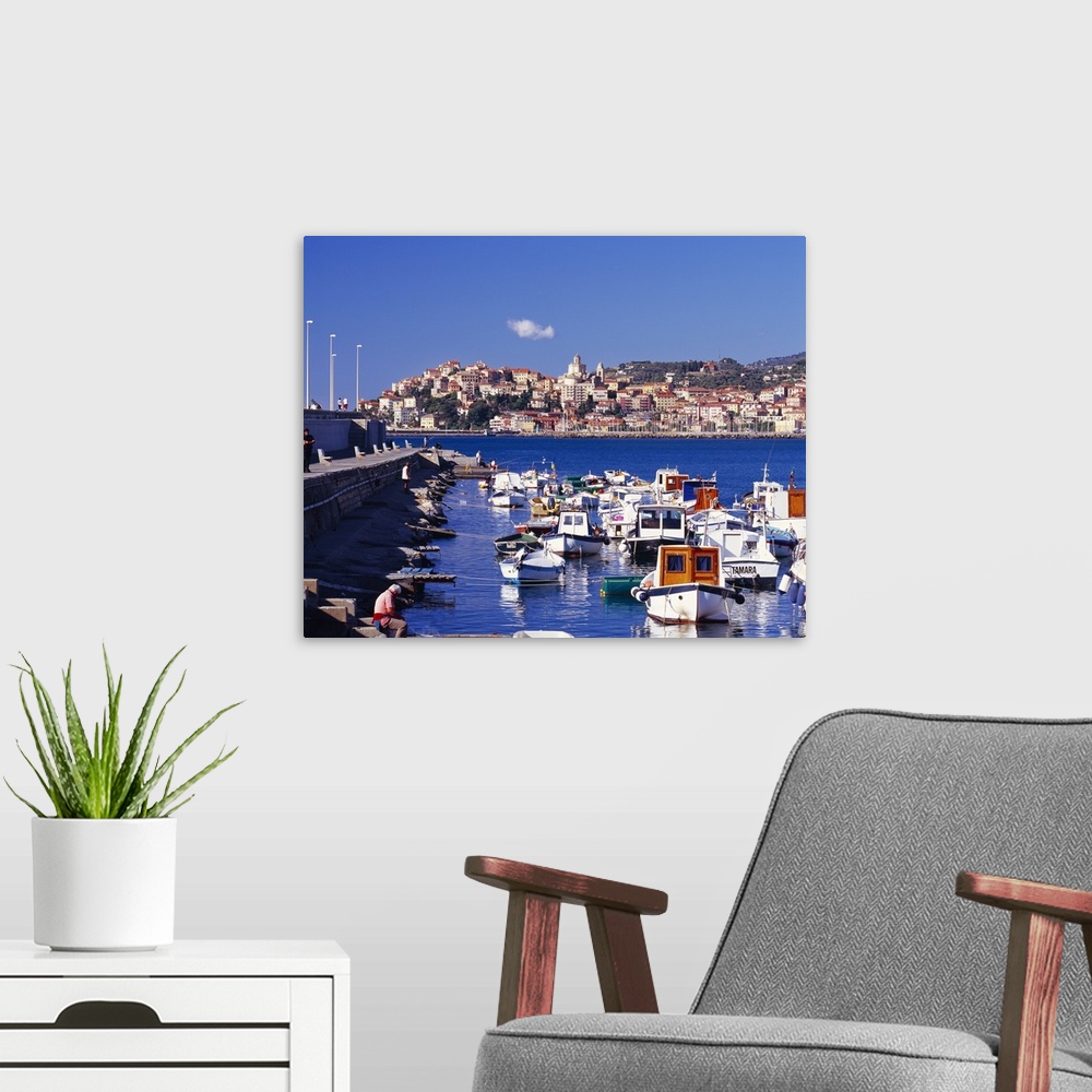 A modern room featuring Italy, Liguria, Imperia, harbour and Porto Maurizio neighborhood in background