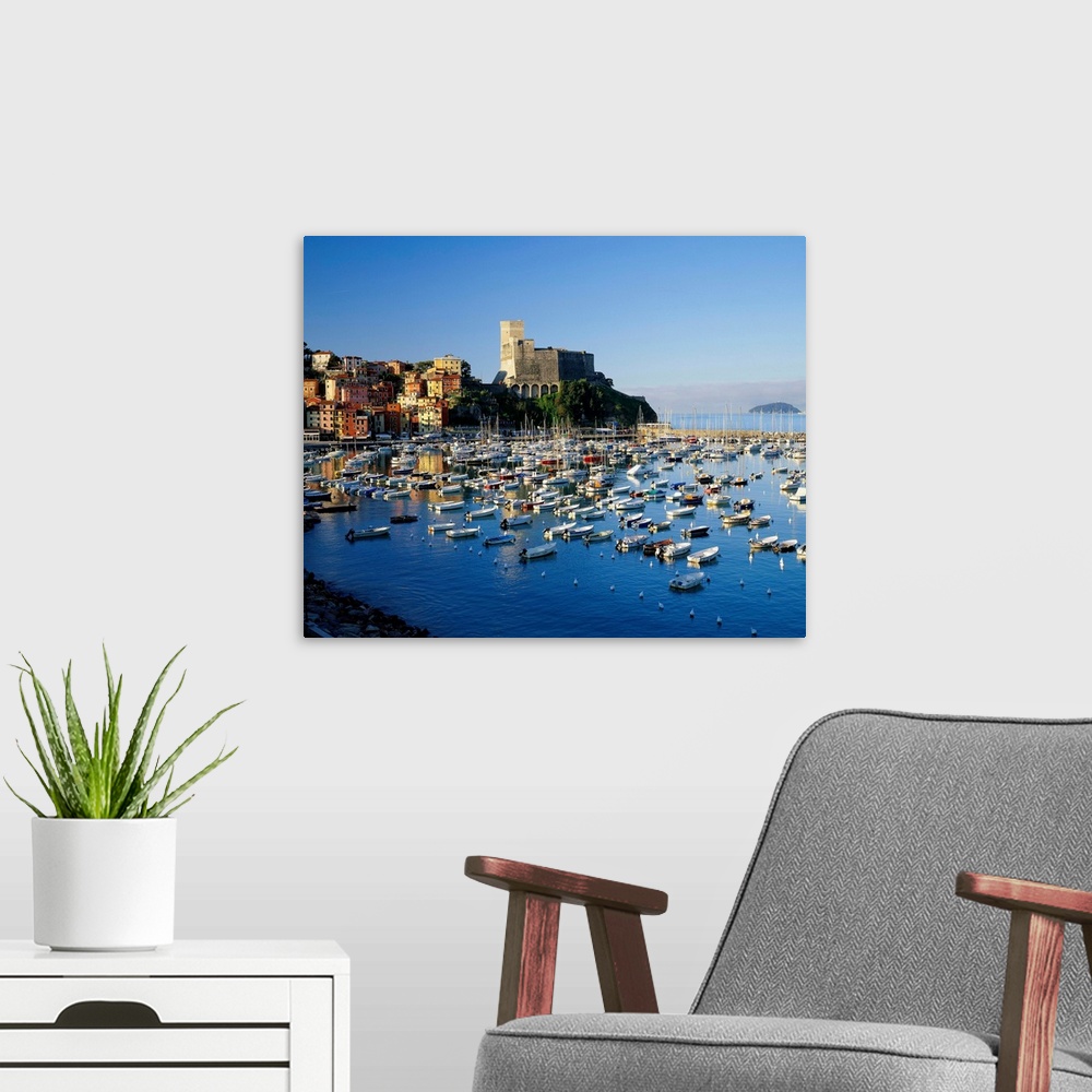 A modern room featuring Italy, Liguria, Lerici town, view towards the harbor and the castle