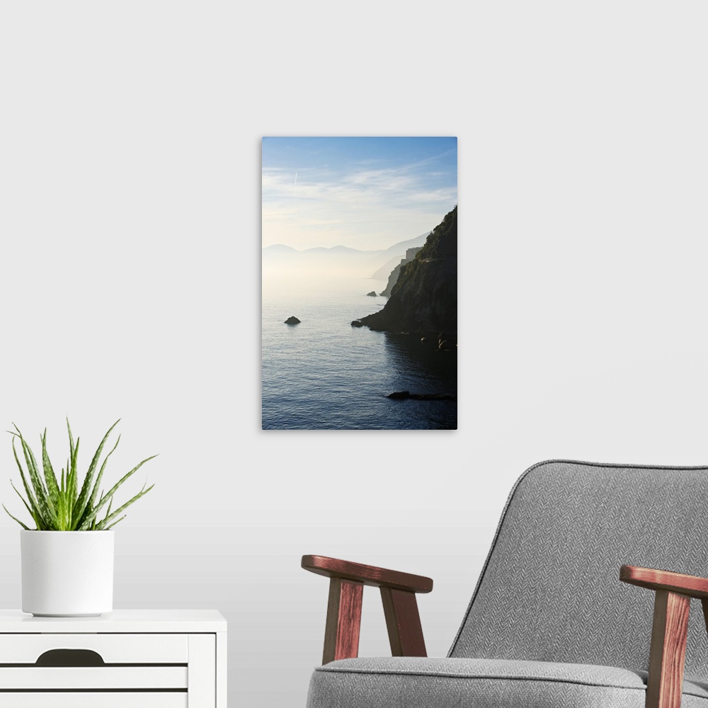 A modern room featuring Italy, Liguria, Vernazza and Monterosso as seen from Corniglia at sunset