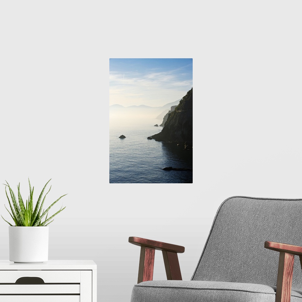 A modern room featuring Italy, Liguria, Vernazza and Monterosso as seen from Corniglia at sunset