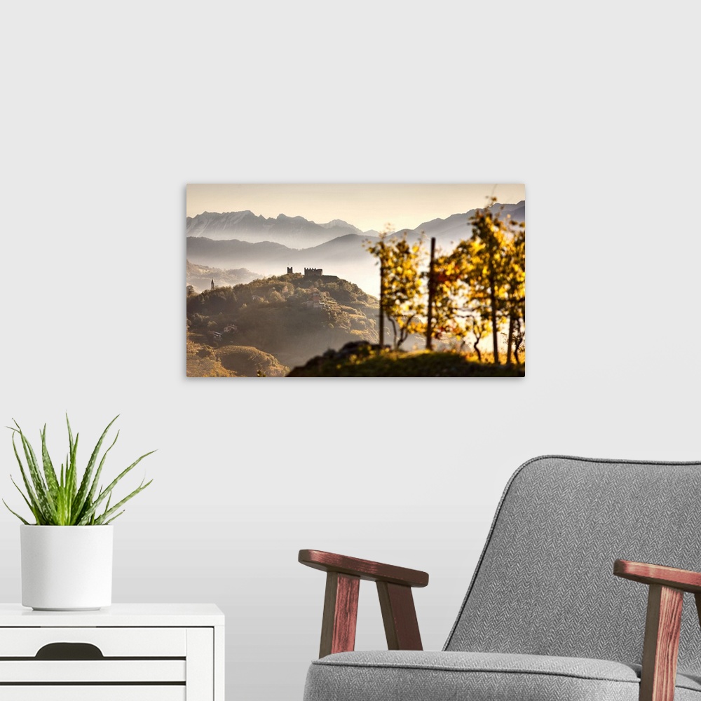 A modern room featuring Italy, Lombardy, Sondrio district, Valtellina, Landscape with Grumello castle on top of the hill ...