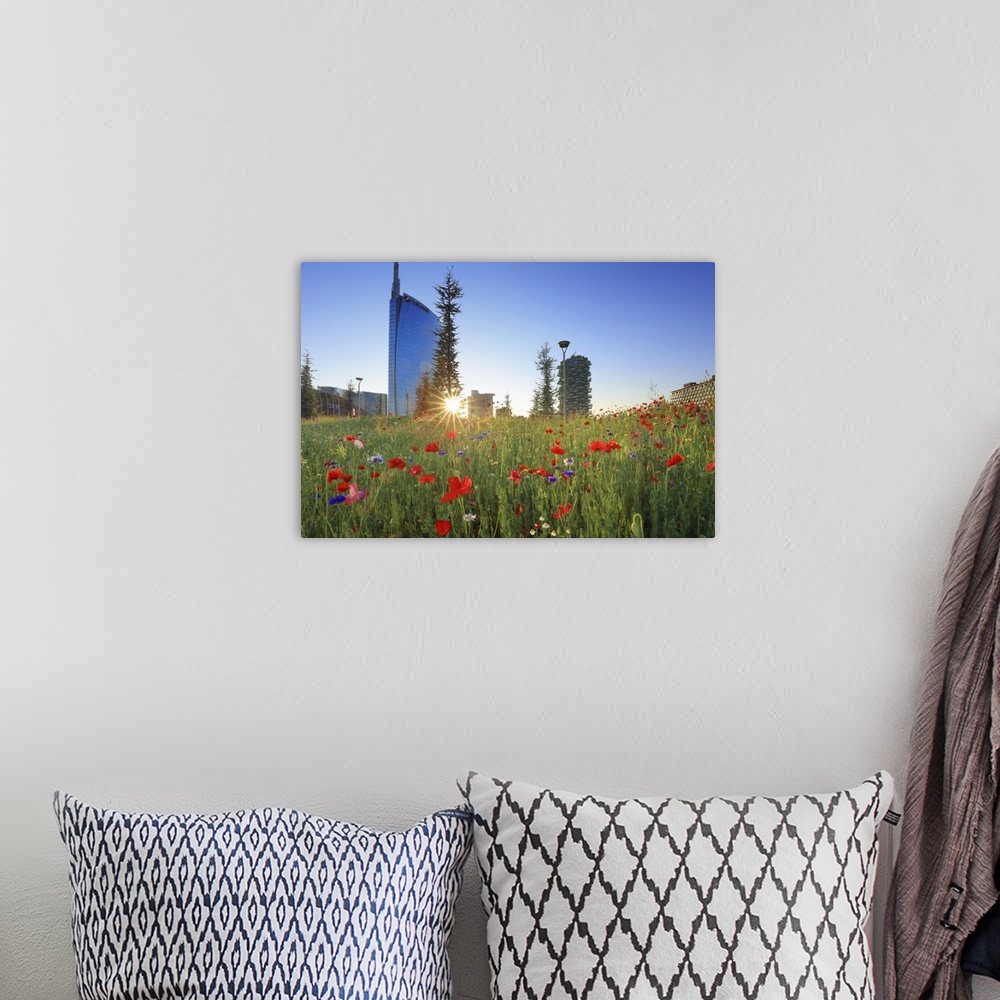 A bohemian room featuring Italy, Lombardy, Milano district, Milan, Porta Nuova, Flowers with the Unicredit Tower and one of...