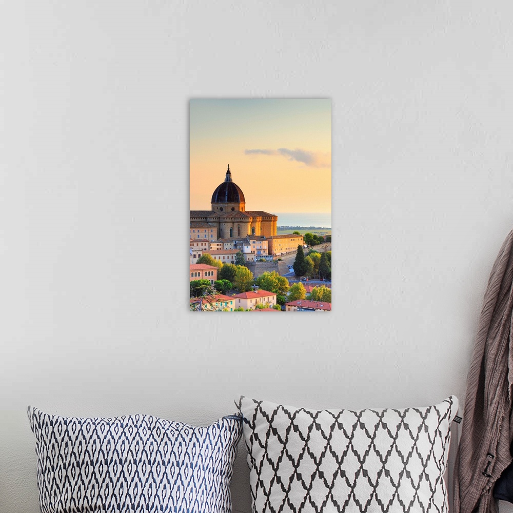 A bohemian room featuring Italy, Marches, Ancona district, Loreto, Loreto Cathedral at sunrise.