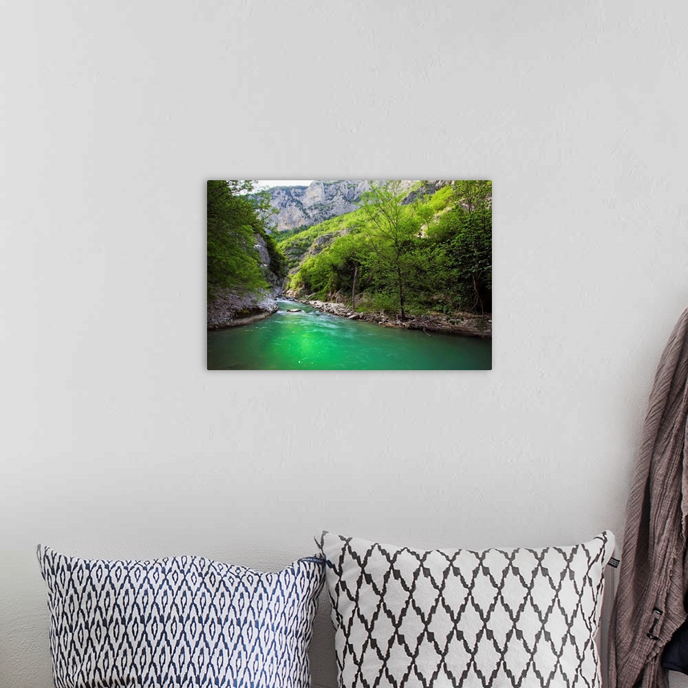A bohemian room featuring Italy, Marches, Ancona district, Genga, Esino river running through the mountains