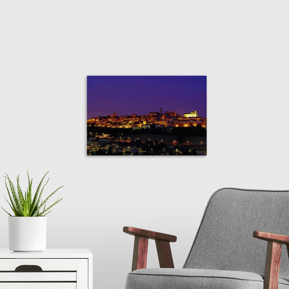 A modern room featuring Italy, Marches, Civitanova Marche, Macerata district, town centre by night