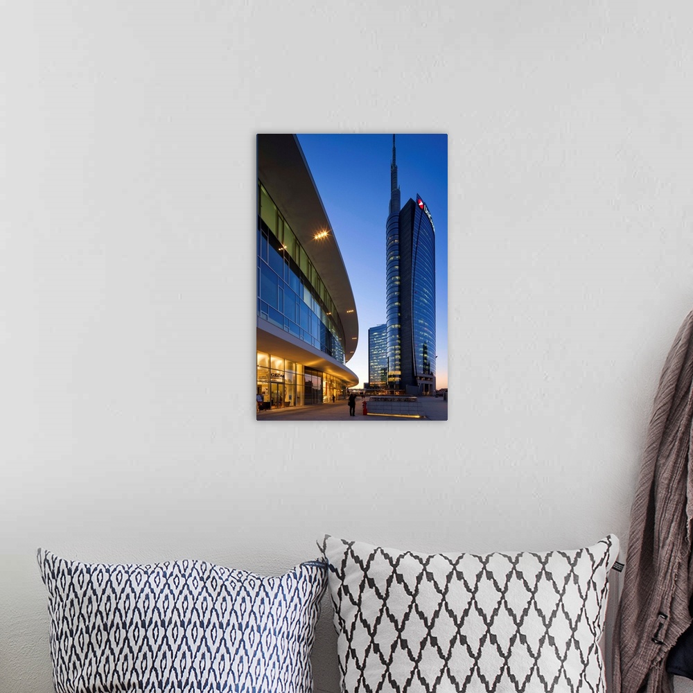 A bohemian room featuring Italy, Lombardy, Milano district, Milan, Cesar Pelli Tower in Gae Aulenti Square.
