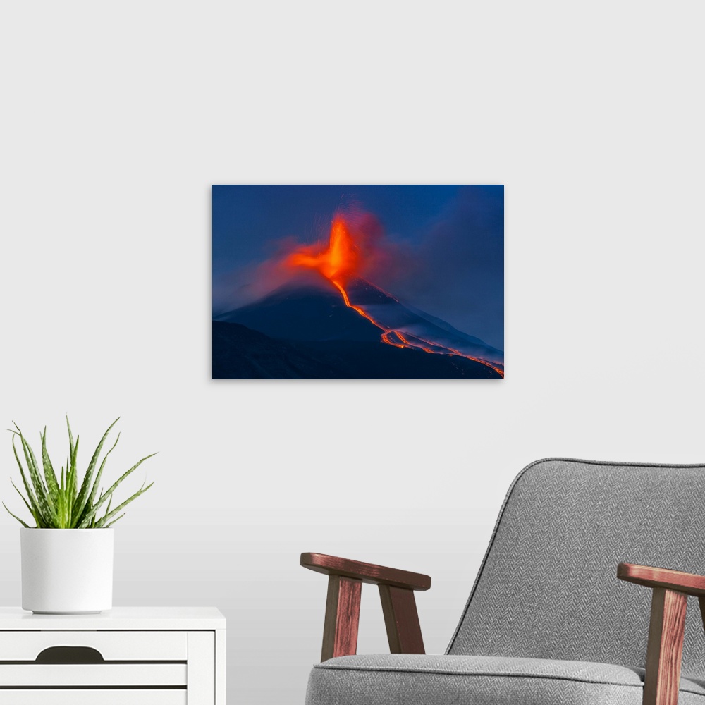 A modern room featuring Italy, Sicily, Catania district, Mount Etna, Strombolian eruption, lava flowing from the south-ea...