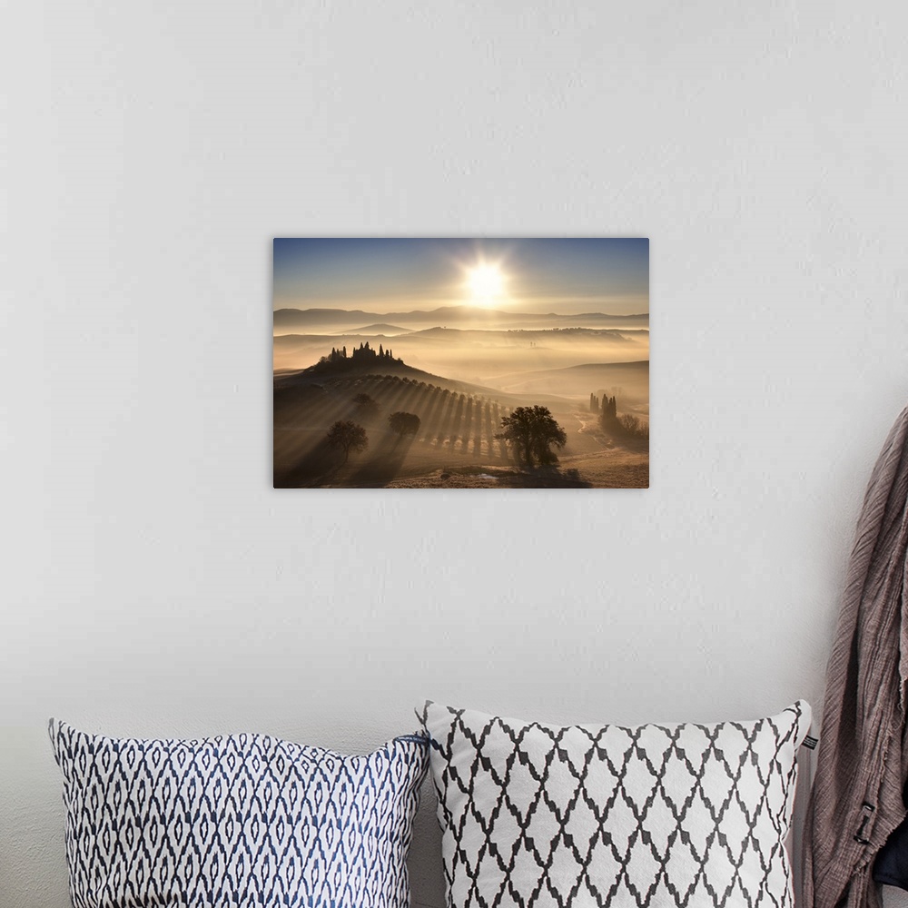 A bohemian room featuring Italy, Tuscany, Siena district, Orcia Valley, Famous Tuscan view with Podere Belvedere at sunrise.