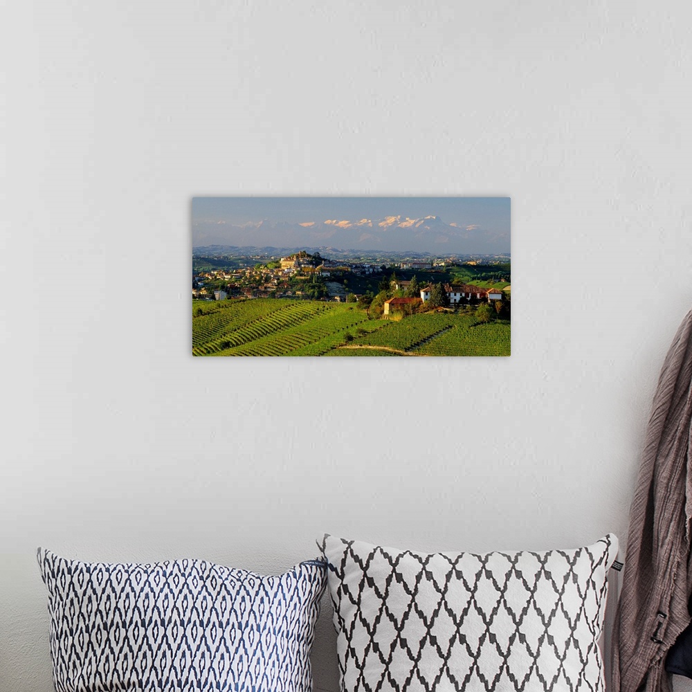 A bohemian room featuring Italy, Piedmont, Monferrato, Castagnole delle Lanze village and Monte Rosa in background