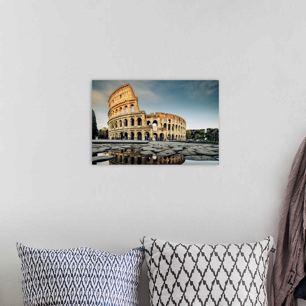 A bohemian room featuring Italy, Rome, Seven Hills of Rome, Colosseum with reflection.