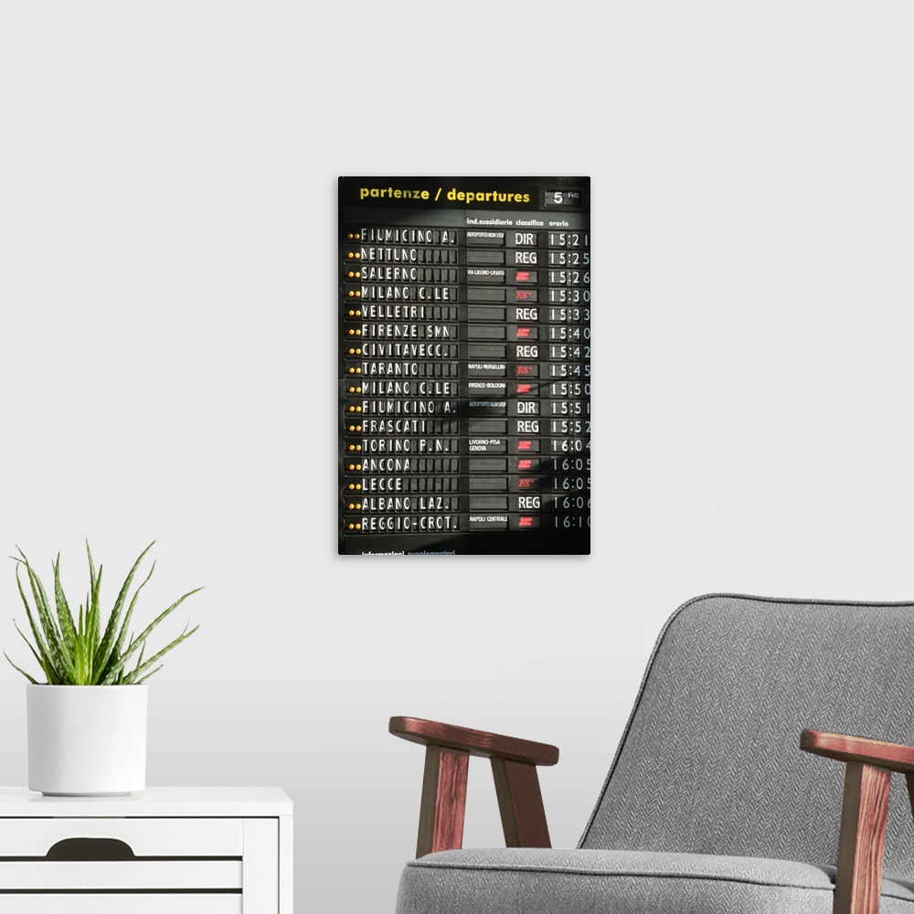 A modern room featuring Italy, Rome, Termini Station, arrival departure board