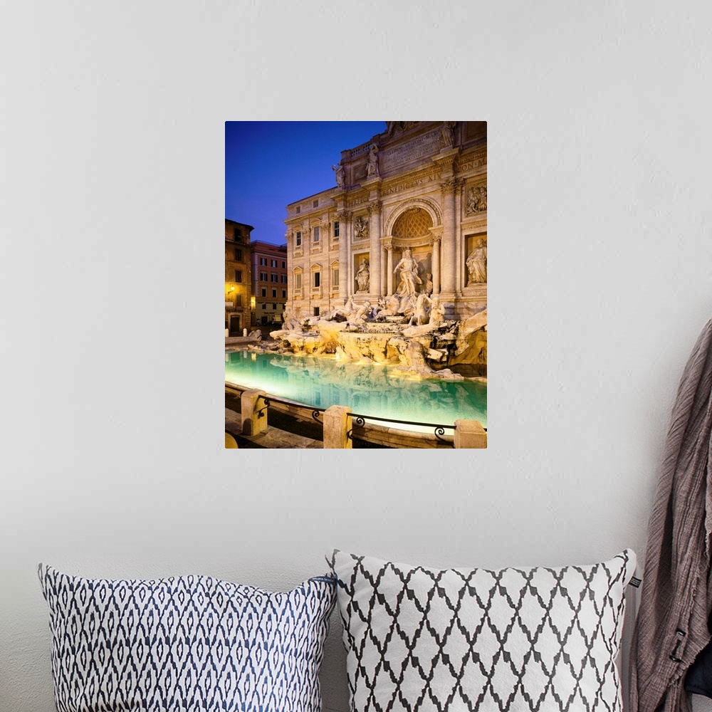 A bohemian room featuring Italy, Rome, Trevi Fountain, night