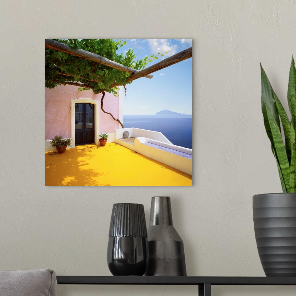 A modern room featuring Italy, Sicily, Alicudi island, typical architecture and Filicudi island in background