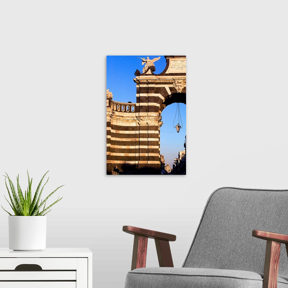 A modern room featuring Italy, Sicily, Catania, Porta Garibaldi, Cathedral dome in background