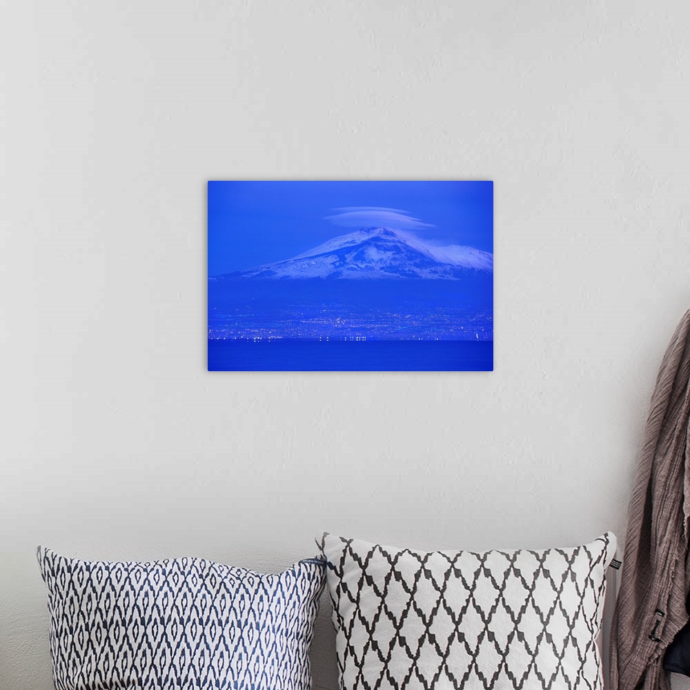 A bohemian room featuring Italy, Sicily, Catania, View to the town and Mount Etna in background