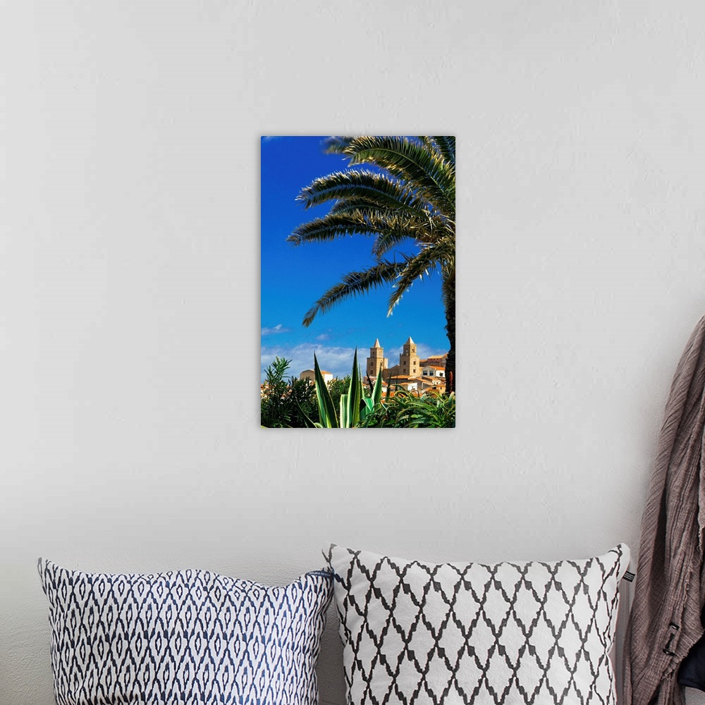 A bohemian room featuring Italy, Italia, Sicily, Sicilia, Cefal., palm tree and cathedral in background
