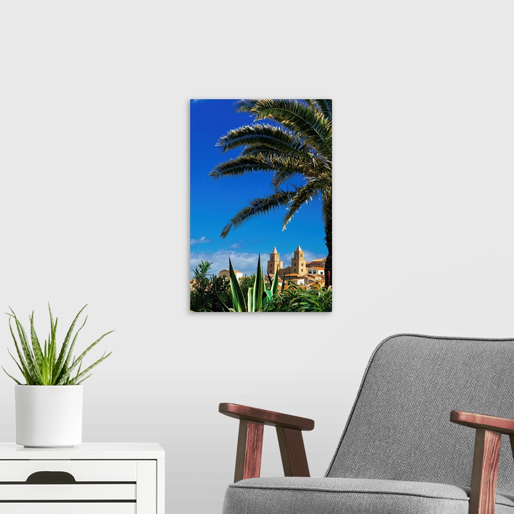 A modern room featuring Italy, Italia, Sicily, Sicilia, Cefal., palm tree and cathedral in background