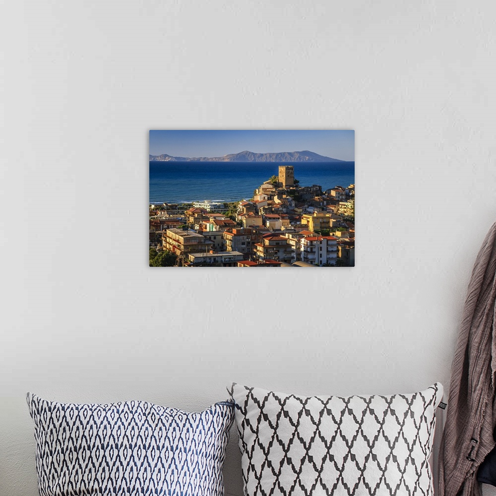 A bohemian room featuring Italy, Sicily, Messina district, Brolo, Brolo Castle, Aeolian islands in background