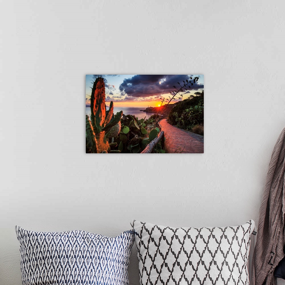 A bohemian room featuring Italy, Sicily, Messina district, Mediterranean sea, Milazzo, Milazzo cape at sunset.
