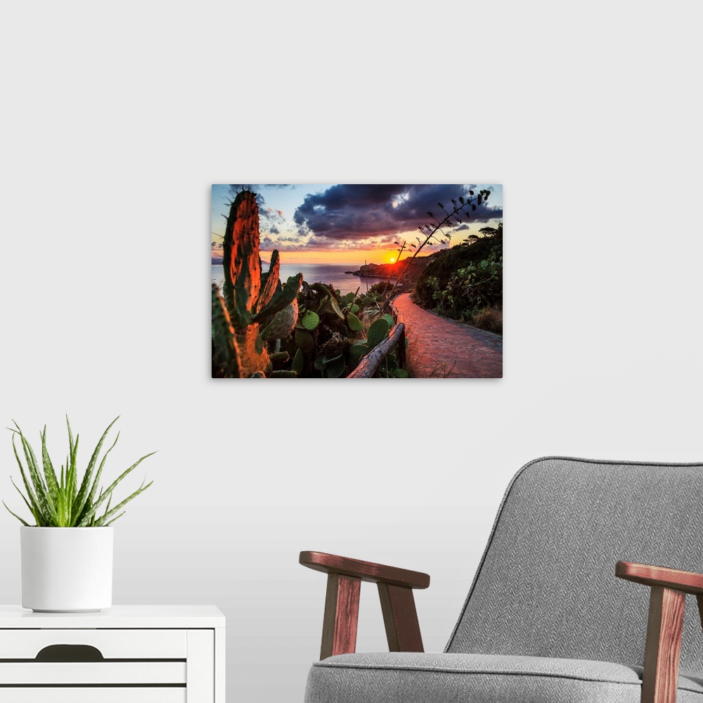 A modern room featuring Italy, Sicily, Messina district, Mediterranean sea, Milazzo, Milazzo cape at sunset.