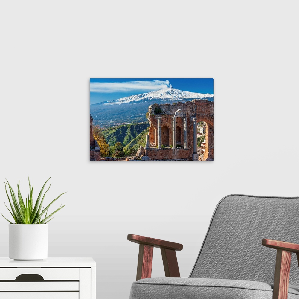 A modern room featuring Italy, Sicily, Messina district, Taormina, Greek Theatre and Mount Etna in background