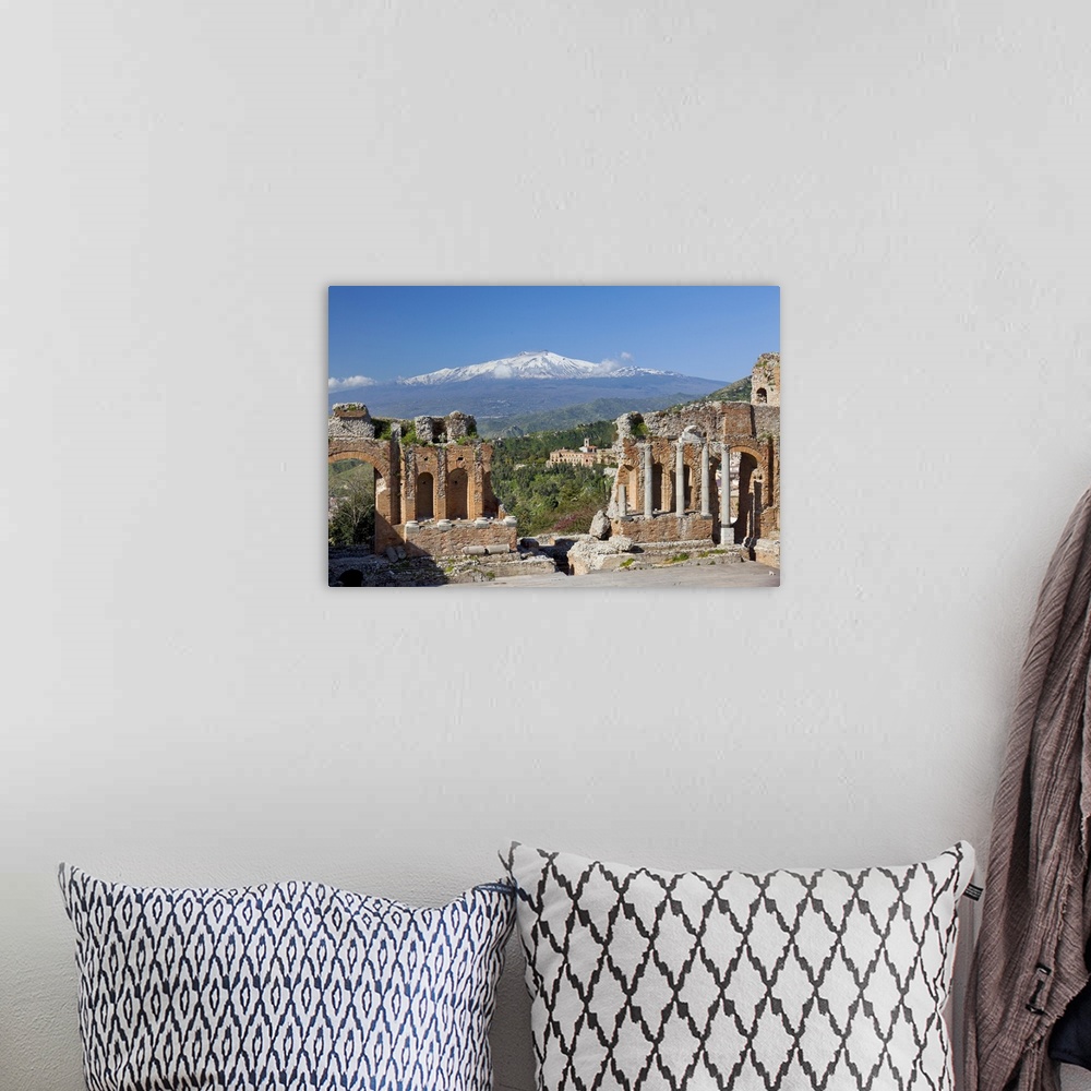 A bohemian room featuring Italy, Sicily, Messina district, Taormina, Greek theatre, Mount Etna in background