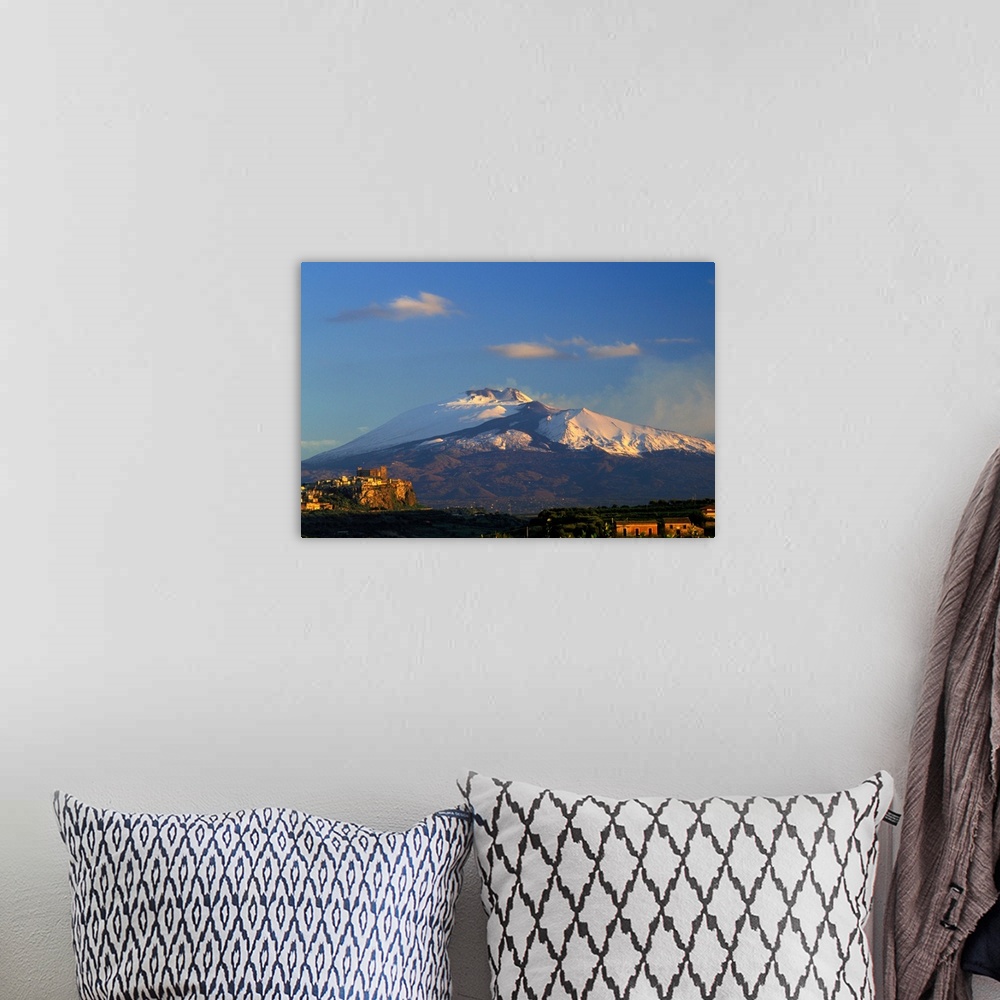 A bohemian room featuring Italy, Sicily, Motta Santa Anastasia, Mount Etna in background