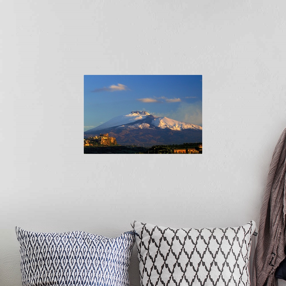 A bohemian room featuring Italy, Sicily, Motta Santa Anastasia, Mount Etna in background